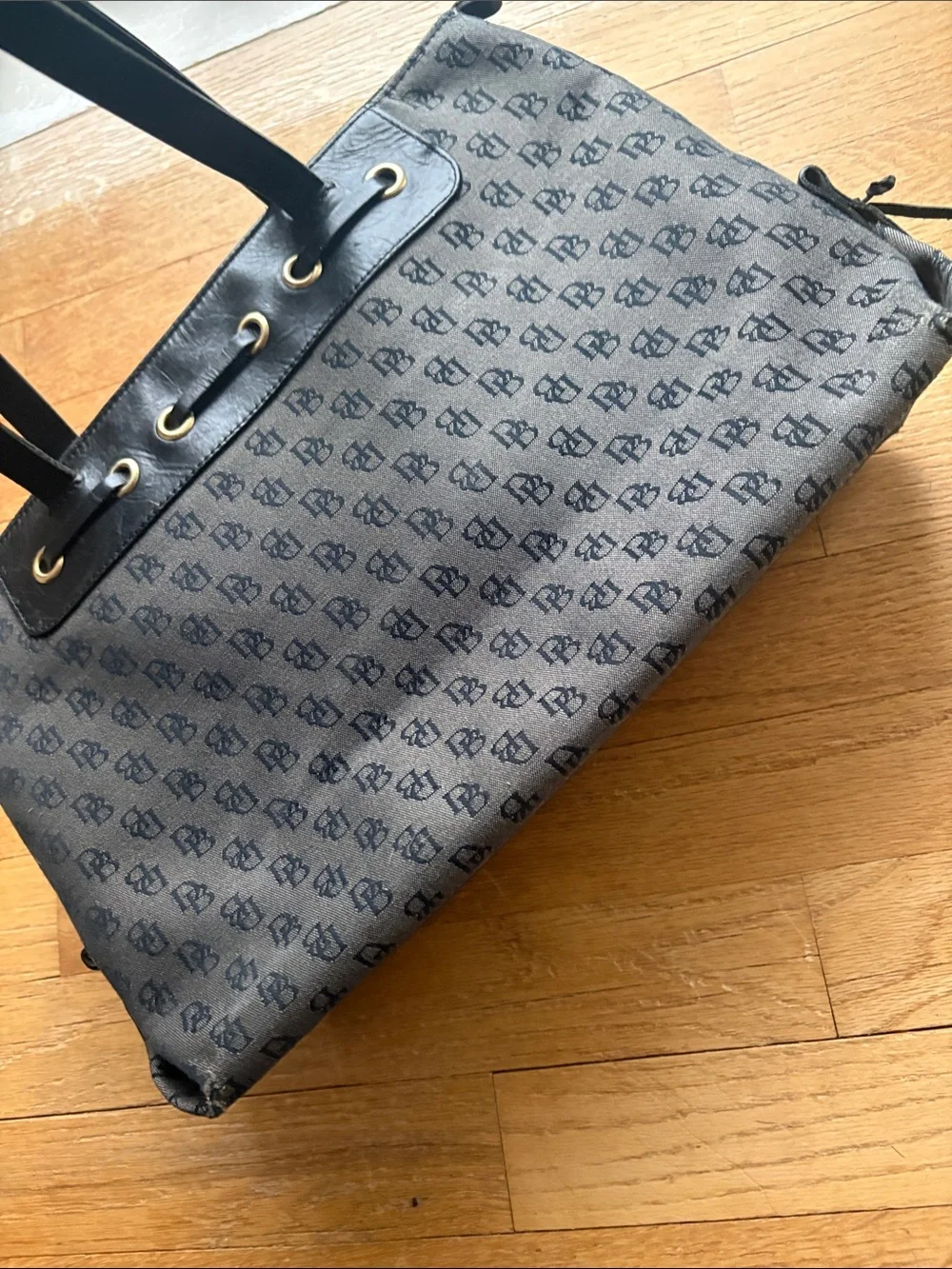 Dooney Black Patterned Tote Bag with Grommet Detail - woman’s